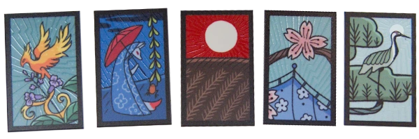 Karty świateł z naszej talii – mają zrobione lakierem promienie mieniące się w świetle